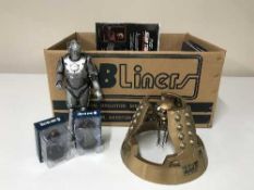 A box containing assorted figures,