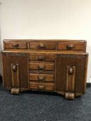A carved oak sideboard
