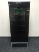 A glass door audio cabinet