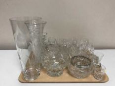 A tray of assorted drinking glasses, glass vases,