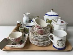 A tray containing Ringtons caddies and teapots, Ringtons mugs,
