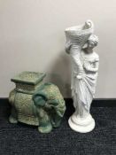 A china elephant plant stand and stone garden feature of a maiden