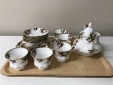 A tray containing a twenty piece Royal Albert Celebration china tea service