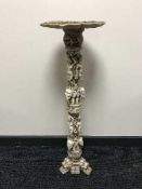 An Eastern resin plant stand depicting elephants