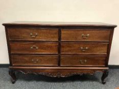A continental style mahogany six drawer chest