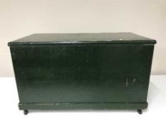 A painted pine blanket box