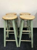 A set of four contemporary bar stools