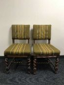 A pair of late 19th century oak dining chairs