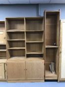 A set of oak open school shelves and pine open shelves