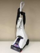 A Bissell clean view carpet cleaner