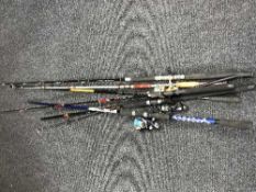 A quantity of assorted fishing rods and reels,