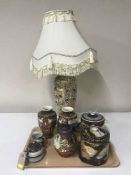An Oriental table lamp and shade together with 7 pieces of Japanese Satsuma ware