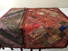 Two Indian beaded wall hangings