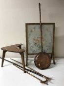 An oak tapestry fire screen, gilt framed mirror, teak table,