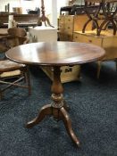 A Victorian pedestal occasional table