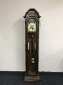 A Granddaughter clock with key,
