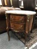 An inlaid walnut marble topped two drawer chest