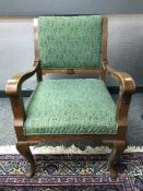 A carved oak framed armchair