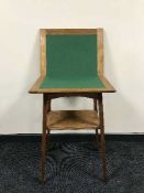 An oak foldover top occasional table