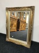 A decorative gilt framed mirror