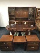 A six piece G Plan dining room suite together with a pair of matching two drawer chests and a nest