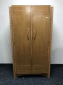 A walnut double door gent's wardrobe