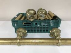A large quantity of brass bar rails with lion mask fittings