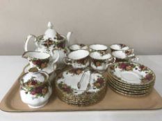 A tray containing 22 pieces of Royal Albert Old Country Roses tea china