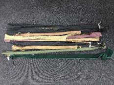 Nine assorted fly rods in carry bags including Leeda, Shakespeare etc,
