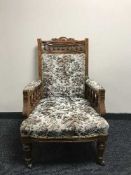 A Victorian carved oak gent's armchair