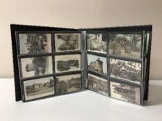 A leather postcard album containing a quantity of antique photos relating to France