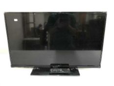 A Panasonic 32 inch LCD TV with remote