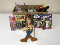 A box containing Star Wars figures, Spice Girls figures, die cast vehicles,