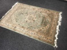 A fringed Persian Keshan rug,