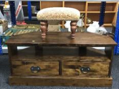 A contemporary Laura Ashley television stand fitted two drawers,