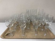 A tray of assorted etched drinking glasses