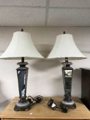 A pair of contemporary mirrored table lamps with shades