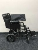 A folding lightweight wheel chair