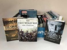 Four boxes containing a large quantity of hardback books,