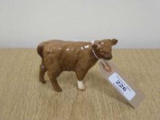 A Beswick figure - Limousin Calf, model 1827E, with Beswick Collector's Club backstamp, gloss.