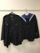 A full rail of Police jackets, trousers, traffic warden uniform,