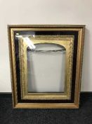 A Victorian style gilt cushioned picture frame