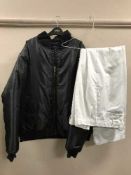 A full rail of outdoor coats,