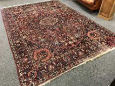 A Persian Heriz carpet