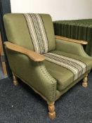 A continental oak framed armchair