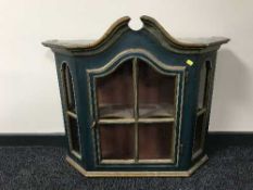 A painted pine curio cabinet