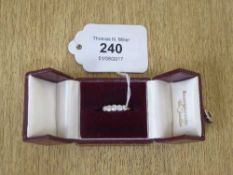 An 18ct gold five stone diamond ring