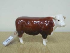 A Beswick figure - Hereford Cow, model 1360, gloss.