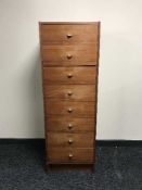 A mid 20th century teak drawer chest