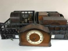 A box of clock parts and clock cases